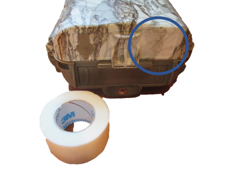 Porous medical adhesive to cover holes in trail camra housing